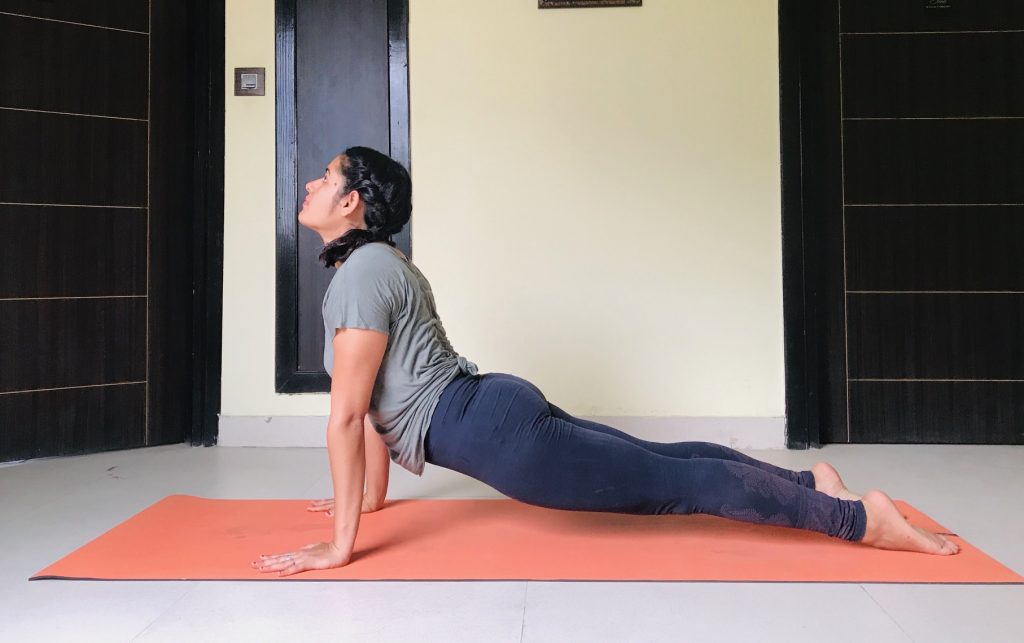 Pregnancy Yoga Poses: 12 Poses for Back Pain, Tight Hips, and More